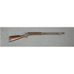 Remington rolling block military rifle, 7mm  cal., 30” round barrel, wood stocks, iron  cleaning rod