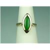 Pleasant 14 karat yellow gold ladies estate  ring bezel set with a very fine apple green  Jade weigh
