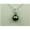 Very elegant 14 karat white gold ladies  pendant set with a center round black Pearl  averaging 8.50