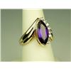 Image 3 : High quality 14 karat yellow gold ladies  custom made ring set with a very fine MQ cut  intense purp