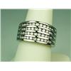 Dazzling 10 karat white gold ladies ring  channel set with 44 round diamonds weighing  approx. 1.30 