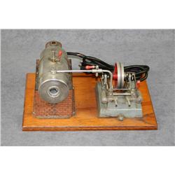 Early electric steam engine toy on wood base  by Jensen Mfg. Co.  appearing to be in  overall good c