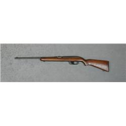 Winchester Model 77 semi-auto rifle, .22 long  cal., 22” round barrel, blue finish, wood  stock, #NV