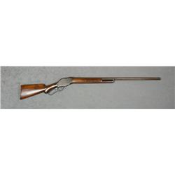 Winchester Model 1887 lever action shotgun,  12 gauge, 32” barrel, blue finish, wood  stocks, #45667