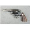 Image 3 : Colt Official Police DA revolver, .38 Special  cal., 4” barrel, blue finish, checkered  medallion wo
