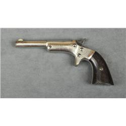 Stevens single shot derringer, .25 cal.,  3-1/2” barrel, nickel finish, wood grips,  #1334. This gun