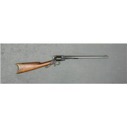 Navy Arms copy of a Remington revolving  percussion rifle, .44 cal., 18” barrel, black  finish, wood