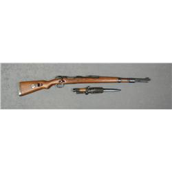 Yugoslavian Mauser 98, #Z4976, 8mm, 24.5"  barrel, blued finish, hardwood stock, tangent  sight grad