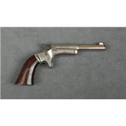 Stevens single shot derringer, .25 cal.,  3-1/2” barrel, nickel finish, wood grips,  #5956. This gun