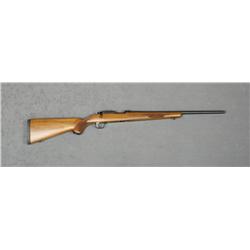 RUGER M-77/22, #701-47133, .22LR, 20" barrel,  blued finish, checkered walnut stock, no  sights.  Ri