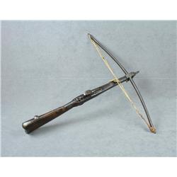Old Crossbow approx. 31” overall with an iron  bow span of approx. 30” with old woven  string pull, 