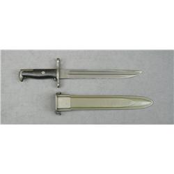 U.S. military bayonet and scabbard in overall  excellent condition with S.A., flaming bomb  and 1920
