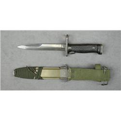 U.S. military bayonet and sheath with woven  hanger, throat of sheath marked U.S.M8A1 and  PWH in ov