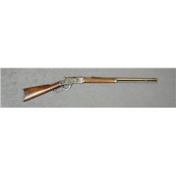 Winchester Model 1873 lever action rifle, .44  WCF cal., 24” round barrel, blue finish,  wood stocks