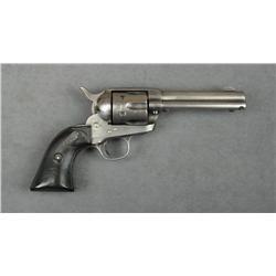 Colt SAA revolver, .32 WCF cal., 4-3/4”  barrel, blue and case hardened finish,  checkered black har