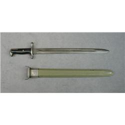 U.S. military bayonet and sheath, longer  1905/1942 style in overall fine condition  showing some we
