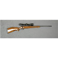 Smith & Wesson Model 1500 bolt-action rifle,  .270 WCF cal., 22” round barrel, black  finish, checke