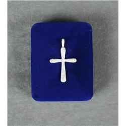 14kt white gold cross set with 0.66 ct of  diamonds. Est. $1,000-$1,500.