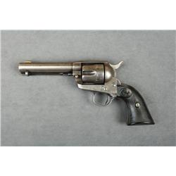 Colt SAA revolver, .32 WCF cal., 4-3/4”  barrel, blue and case hardened finish,  checkered black har