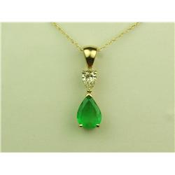 High quality 14 karat yellow gold ladies  handmade necklace set with a pear shape green  Emerald wei