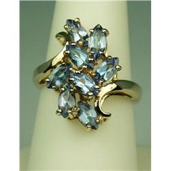 Pleasant 10 karat yellow gold ladies cluster  design ring fine set with 8 MQ cut Tanzanites  weighin