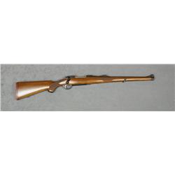Ruger Model 77 bolt-action rifle, 30-06 cal.,  19” barrel, black finish, full checkered  stock, slin
