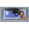 Image 2 : Smith & Wesson Model 10-6 DA revolver, .38  S&W Special cal., 4” heavy barrel, blue  finish, checked