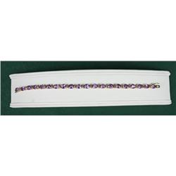 Terrific 14 karat heavy yellow gold ladies  bracelet fine set with 20 oval Amethysts  weighing appro