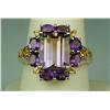 Image 1 : Fashionable 10 karat yellow gold ladies ring  set with a combination of Amethyst and  Citrines weigh