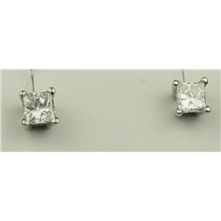 Brilliant 14 karat white gold ladies stud  earrings set with two princess cut diamonds  weighing app