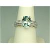 Image 1 : Gorgeous 14 karat white gold ladies ring set  with a center fine oval Aquamarine weighing  approx. 3