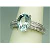 Image 2 : Gorgeous 14 karat white gold ladies ring set  with a center fine oval Aquamarine weighing  approx. 3