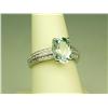Image 3 : Gorgeous 14 karat white gold ladies ring set  with a center fine oval Aquamarine weighing  approx. 3