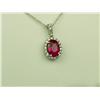 Image 1 : Splendid 10 karat white gold ladies pendant  set with an oval purplish red Ruby weighing  approx. 2.