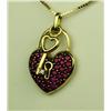 Image 3 : Charming 10 karat yellow gold ladies custom  made lock and key pendant pave set with fine  red Rubie