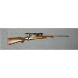 Ruger Model 77 bolt-action rifle, 7 x 57  cal., 22” barrel, black finish, checkered  wood stocks wit