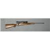 Image 1 : Ruger Model 77 bolt-action rifle, 7 x 57  cal., 22” barrel, black finish, checkered  wood stocks wit