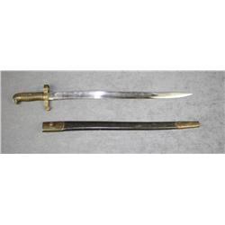 European bayonet and leather scabbard approx.  25-1/2” overall with a brass grip and cross  guard, u