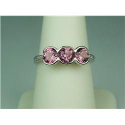 Stylish 14 karat white gold ladies designer  ring bezel set with three matching round pink  Topaz we