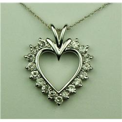 Splendid 10 karat white gold ladies heart  design pendant set with 18 round diamonds  weighing appro