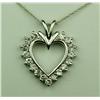 Image 1 : Splendid 10 karat white gold ladies heart  design pendant set with 18 round diamonds  weighing appro