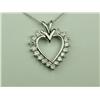 Image 2 : Splendid 10 karat white gold ladies heart  design pendant set with 18 round diamonds  weighing appro