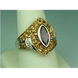 Fashionable 10 karat yellow gold ladies  custom made ring bezel set with a center MQ  cut Amethyst w