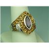 Image 1 : Fashionable 10 karat yellow gold ladies  custom made ring bezel set with a center MQ  cut Amethyst w