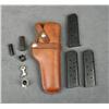 Image 1 : Misc. lot including a Hunter leather holster,  three Colt 1911 style magazines with  assorted parts,