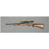 Image 2 : Ruger Model 10/22 semi-auto carbine, .22LR  cal., 18-1/2” barrel, black finish, checkered  wood stoc