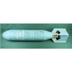 U.S.A.F. Practice bomb, approx. 4 feet in  height including fins, approx. 8” in diameter  and in ove