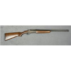 Savage Model 24 O/U combo gun, .22 Win. Mag.  RF over .410 gauge barrel, 24” barrels, blue  and case