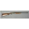Image 1 : Savage Model 24 O/U combo gun, .22 Win. Mag.  RF over .410 gauge barrel, 24” barrels, blue  and case