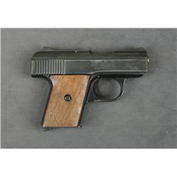 Raven Arms Model MP-25 semi-auto pistol, .25  cal., 2-1/4” barrel, blue finish, wood  stocks, #14068